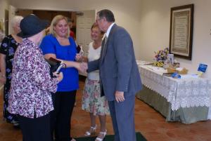 Pastor Greeting His People